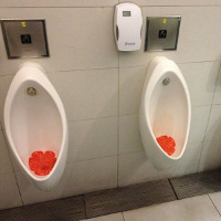 Patented flower design fits all urinal styles