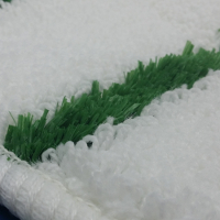 Looped white polyester with green scrubbing stripes